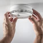 Home smoke and fire alarm detector installing, checking, testing or replace battery